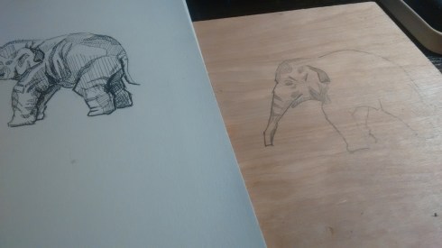 Copying my ink sketch of an elephant onto a wood panel